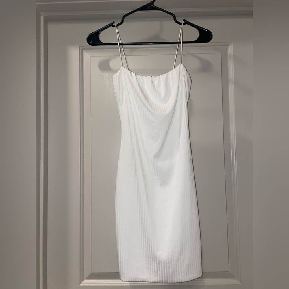 White rubbed mini dress. Never worn. Size small.